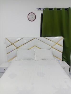 1 chambre, fer et planche à repasser, accès au Wi-Fi (inclus)