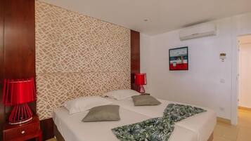 2 dormitorios, tabla de planchar con plancha, wifi gratis y ropa de cama
