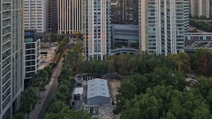 A cityscape with high-rise buildings, including modern skyscrapers and a mix of architectural styles. - High -Rise waterfront Apartment (London)