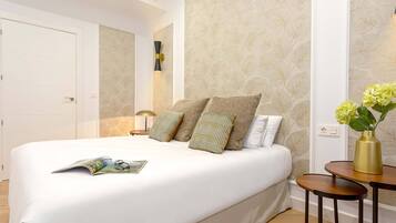 4 slaapkamers, een strijkplank/strijkijzer, beddengoed