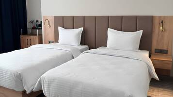 Habitación estándar con 2 camas individuales | Caja de seguridad en la habitación y wifi gratis