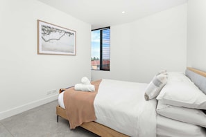 Iron/ironing board, travel crib, WiFi, bed sheets