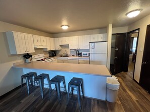 Fridge, microwave, oven, stovetop - Cozy Dillon Condo with Pool, Hot Tub & Year-Round Recreation — Dog Friendly (Dillon)