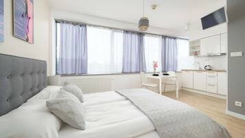 Iron/ironing board, travel crib, WiFi, bed sheets