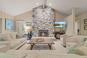 TV, fireplace, DVD player, books - Spacious Resort Home Near Shanty Creek | 3BR • 3BA • Pool • Firepit (Bellaire)