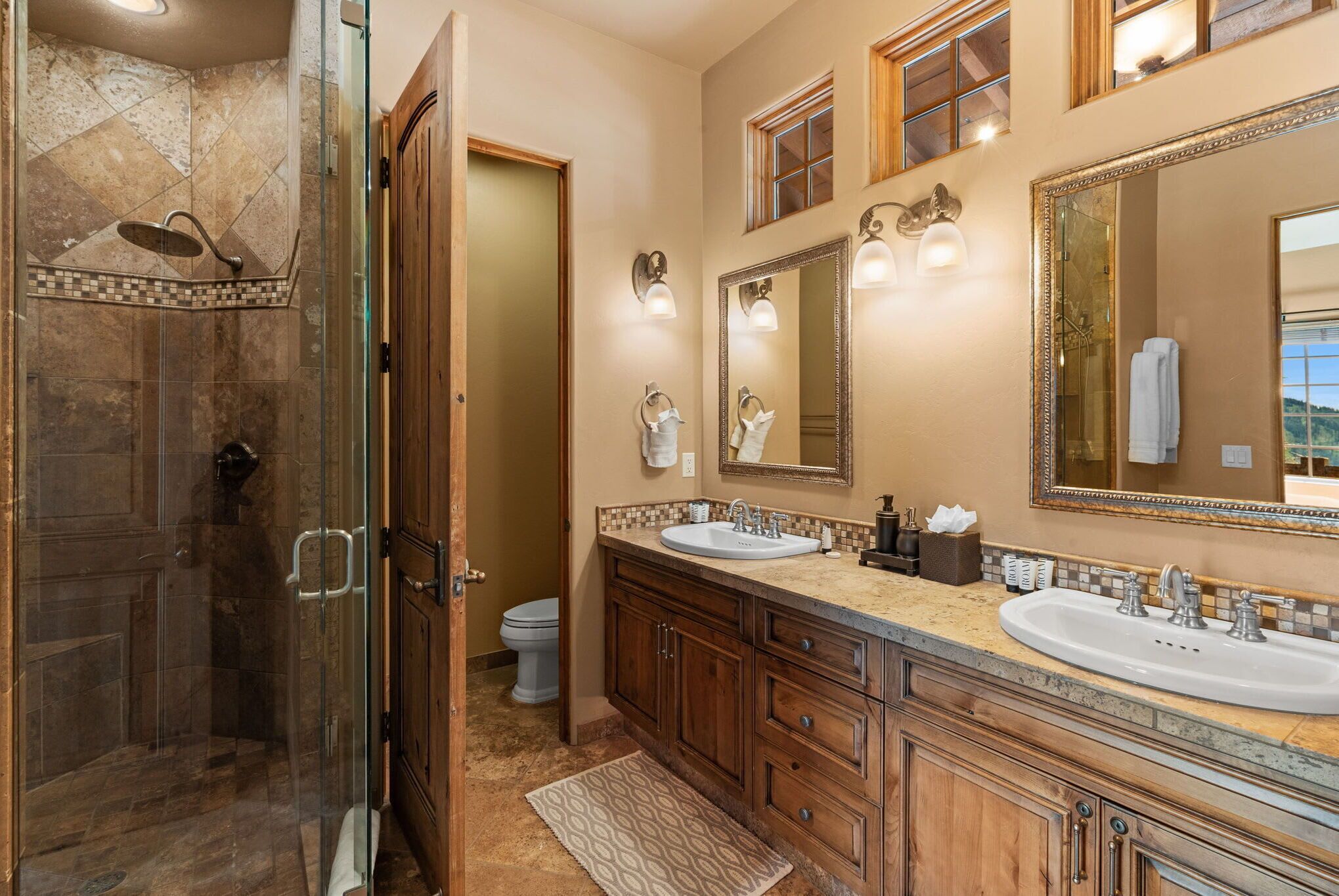 Shower, hair dryer, towels, shampoo