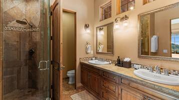 Shower, hair dryer, towels, shampoo