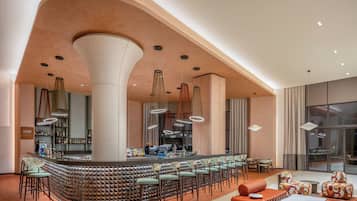6 bars/lounges, poolside bar, beach bar