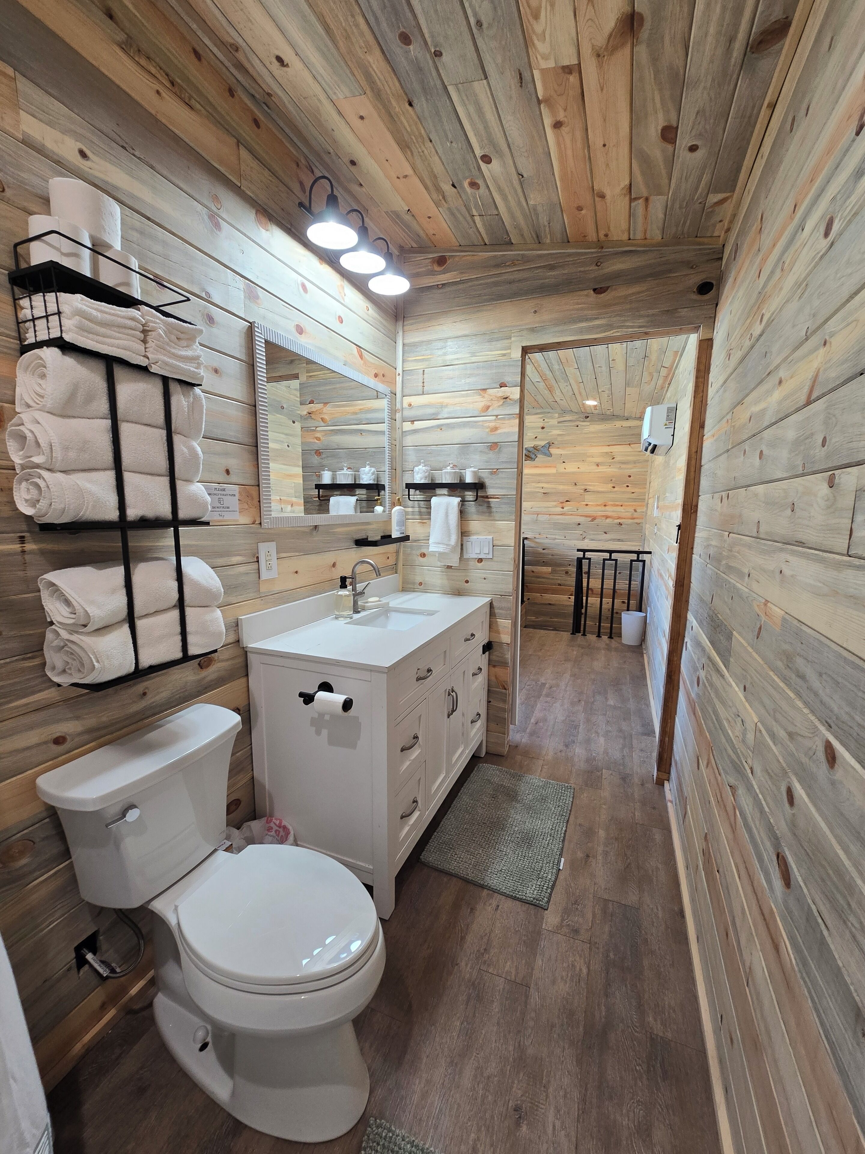 Shower, towels, soap, toilet paper
