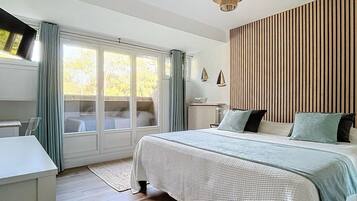 4 slaapkamers, een strijkplank/strijkijzer, internet, beddengoed