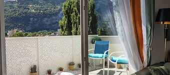 Cozy, Spacious condo with balcony and beautiful serene mountain views.