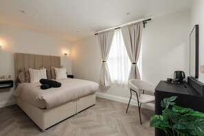 1 غرفة نوم ومكواة/لوح كي وواي فاي مجانًا وملاءات أسرّة