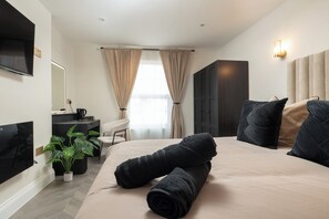 1 Schlafzimmer, BĂŒgeleisen/BĂŒgelbrett, kostenloses WLAN, BettwĂ€sche