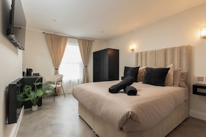 1 Schlafzimmer, BĂŒgeleisen/BĂŒgelbrett, kostenloses WLAN, BettwĂ€sche