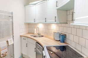 Microondas, horno, placa de cocina, tostadora