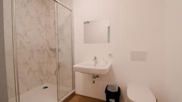 Shower, free toiletries, hair dryer, towels