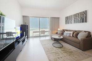Apartamento, vista para o mar | Área de estar