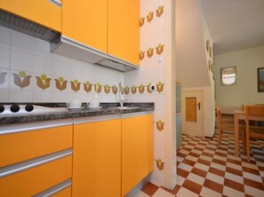 Fridge, microwave, stovetop, cookware/dishes/utensils