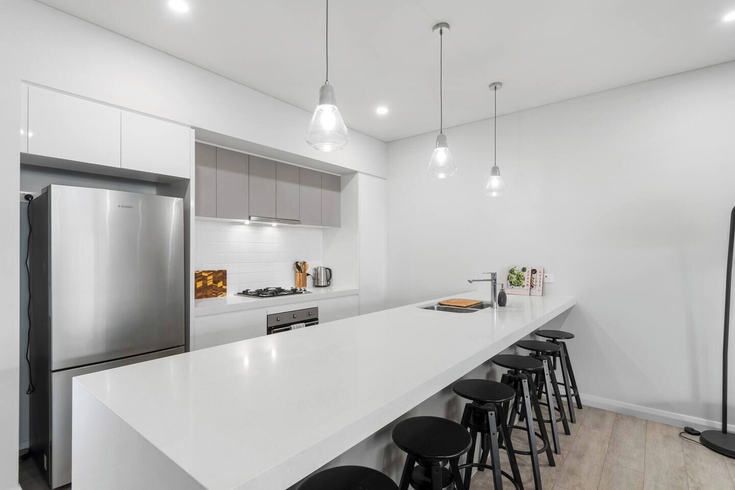 Enjoy a laid-back breakfast at the oversized kitchen island, with seating for six and plenty of space to gather and plan the day.