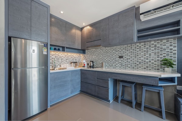 Apartamento, sacada | Cozinha privada