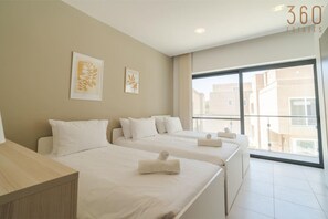 3 bedrooms, desk, iron/ironing board, travel cot