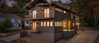 Escape to a brand-new, luxurious haven nestled among the trees, offering the perfect blend of tranquility and city convenience. This stunning, modern home is centrally located, placing you just minutes from all of Chattanooga's attractions.