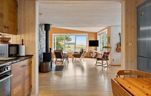 Fridge, stovetop, dishwasher, coffee/tea maker