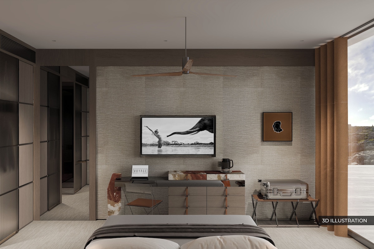 A modern bedroom with a large bed, a desk, and a large window.