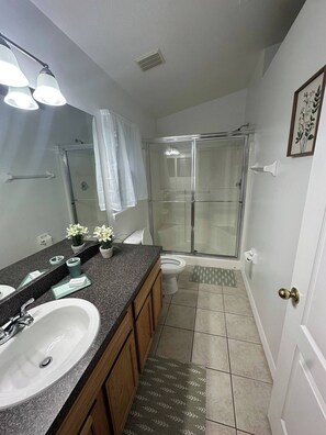 Shower, hair dryer, towels, soap