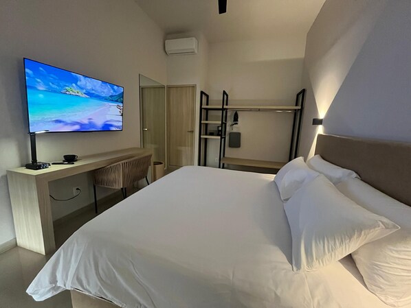 Standard Double Room | Desk, laptop workspace, blackout drapes, iron/ironing board