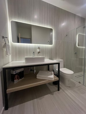 Bathtub, hair dryer, towels, soap