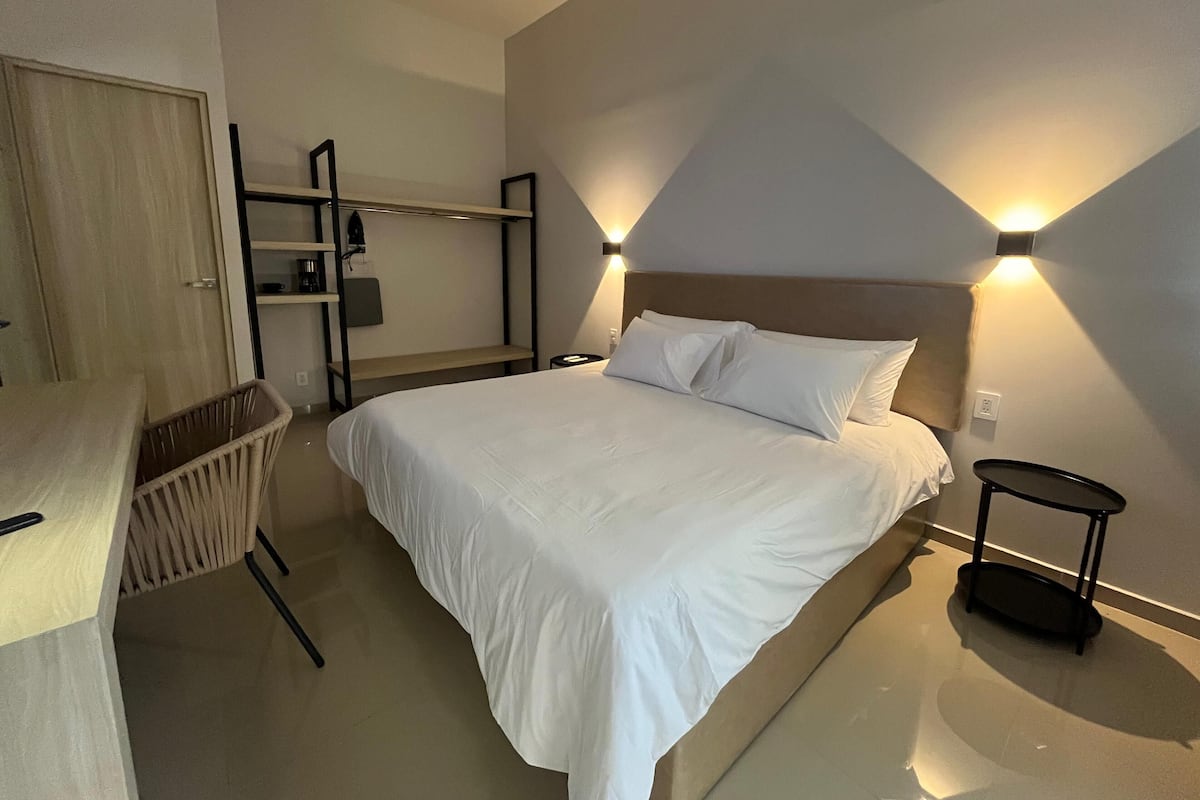 Standard Double Room | Desk, laptop workspace, blackout drapes, iron/ironing board