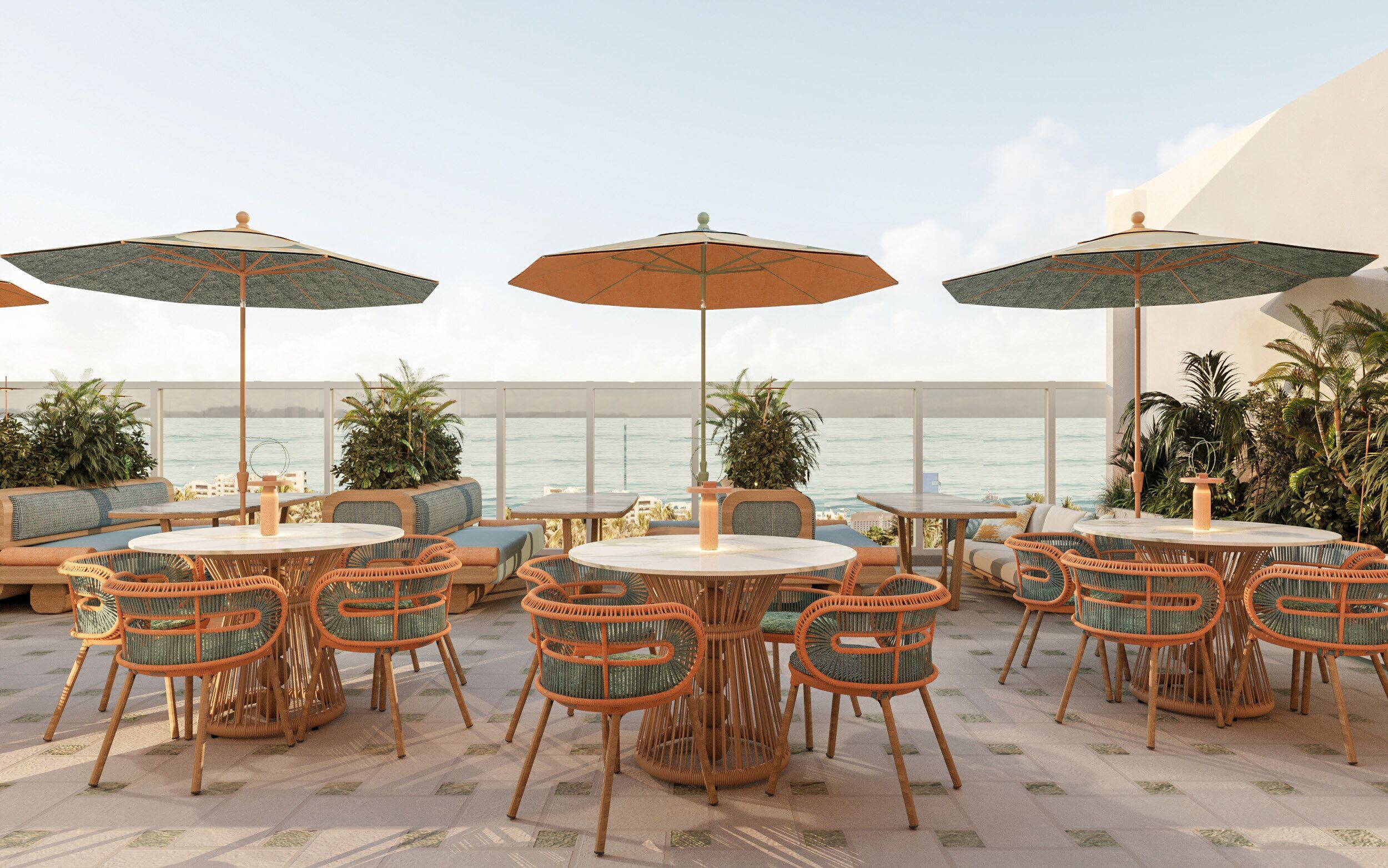 A rooftop terrace with round tables and wicker chairs, large umbrellas, and potted plants.