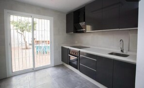 Apartment, Patio | Private kitchen