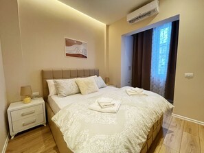 1 habitación, tabla de planchar con plancha, wifi gratis y ropa de cama