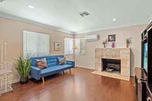 House, Multiple Beds, Patio, Garden View (1828 Pomona) | Living area | 42-inch flat-screen TV with digital channels, fireplace