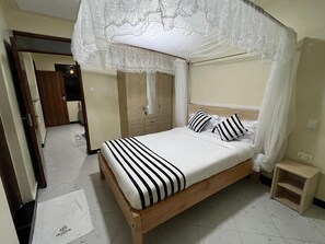 1 غرفة نوم ومكواة/لوح كي وواي فاي وملاءات أسرّة