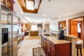 Condo, 4 Bedrooms, Balcony | Private kitchen | Microwave, stovetop, dishwasher, coffee/tea maker