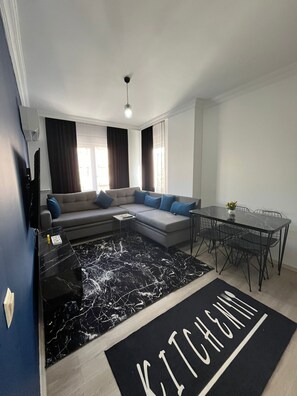 Appartement Standard, 1 lit double et 1 canapé-lit, climatisation | Coin séjour