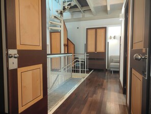 Deluxe Duplex, City View | Living area