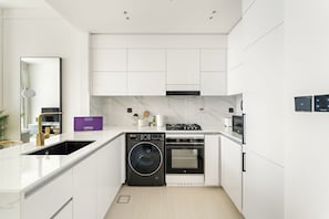 Design Apartment | Private kitchen | Microwave, oven, stovetop, coffee/tea maker