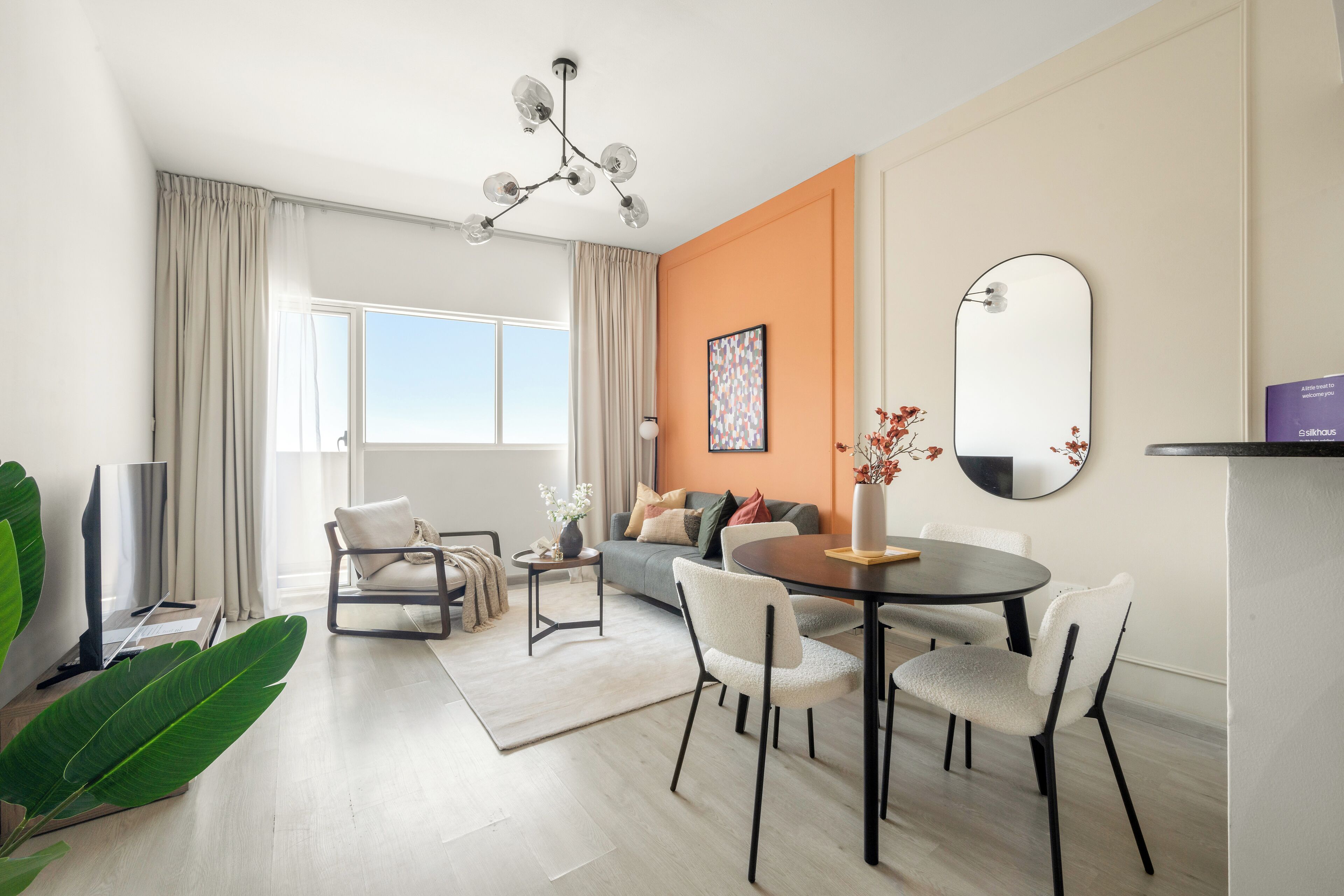 Comfort Apartment | Living area | 50-inch Smart TV with digital channels