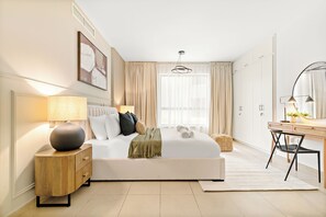 Elite Apartment | Egyptian cotton sheets, premium bedding, memory-foam beds, in-room safe