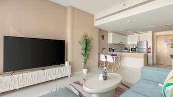 Executive Apartment | Living area | 50-inch Smart TV with digital channels