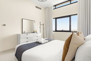 Superior Apartment | Living area | 50-inch Smart TV with digital channels