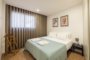 1 habitación, tabla de planchar con plancha, wifi y ropa de cama 