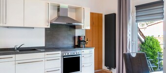 Apartment 'Ferienhaus Behrends' with Private Terrace, Shared Garden and Wi-Fi