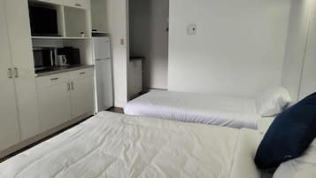 Habitación triple clásica | Wifi gratis y ropa de cama