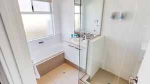 Shower, hair dryer, towels
