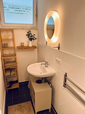 Hair dryer, towels, soap, toilet paper